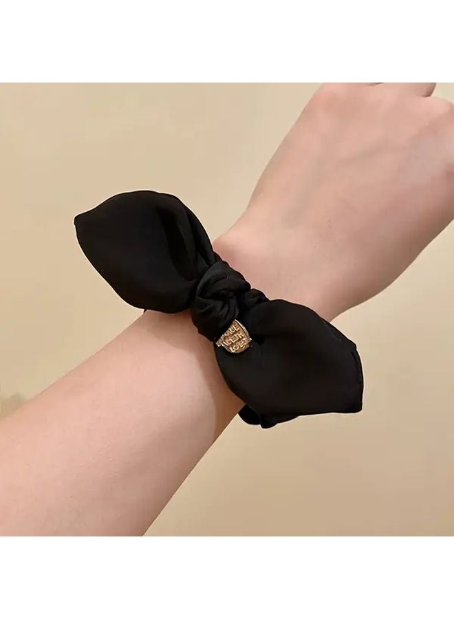 Black Satin Bow Hair Tie Scrunchie For Women And Teens With Golden Accents - Image 2